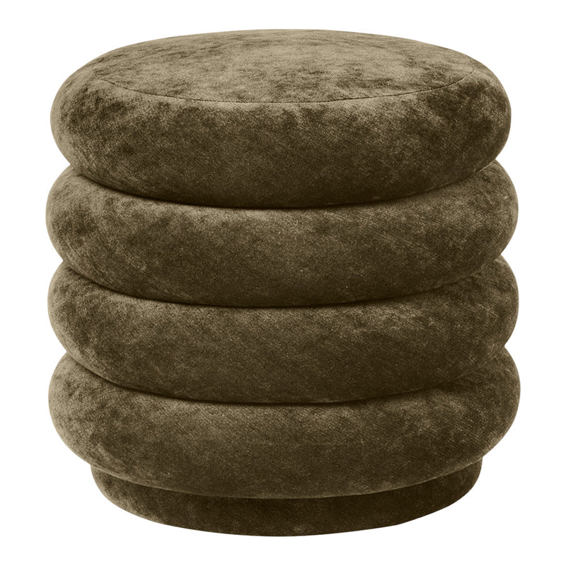 Round stackable ottoman in soft olive green velvet with smooth, plush texture and no visible patterns.