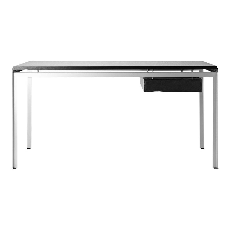 Sleek black glass tabletop with a minimalist design, supported by a polished silver metal frame and a black drawer.