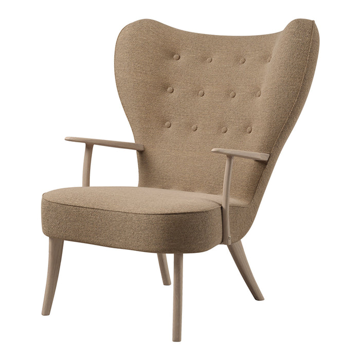 Stylish beige armchair with tufted fabric and natural wood legs, featuring a modern design and elegant silhouette.