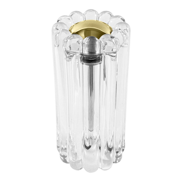 Clear glass lamp with a ribbed design and metallic gold accents, creating a modern, elegant look.
