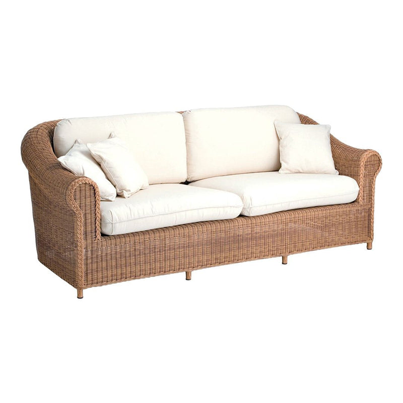 Natural rattan sofa with cream cushions and subtle texture, perfect for cozy, stylish living spaces.