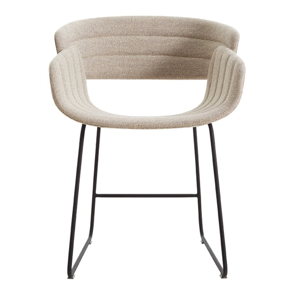 Beige upholstered chair with ribbed pattern and sleek black metal legs for a modern touch in any space.