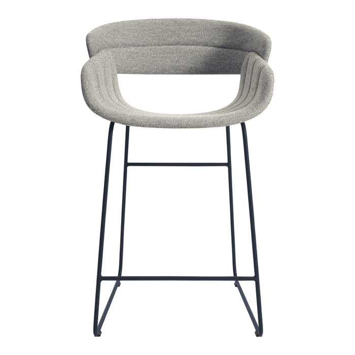 Gray upholstered bar stool with a curved design and black metal legs, featuring subtle textured patterns.