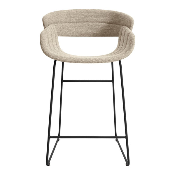 Beige upholstered barstool with ribbed pattern and black metal frame, minimalist design for modern spaces.