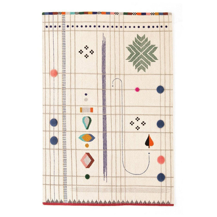 Colorful patterned textile with geometric designs, featuring green, pink, blue, and orange on a cream background.
