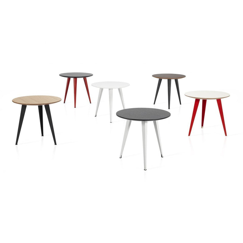 Colorful side tables featuring round tops in black, white, gray, and wood tones with contrasting leg colors and patterns.