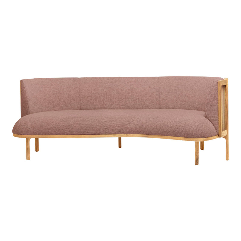 Modern curved sofa in soft mauve fabric with light wood accents, featuring a minimalist design and subtle texture.