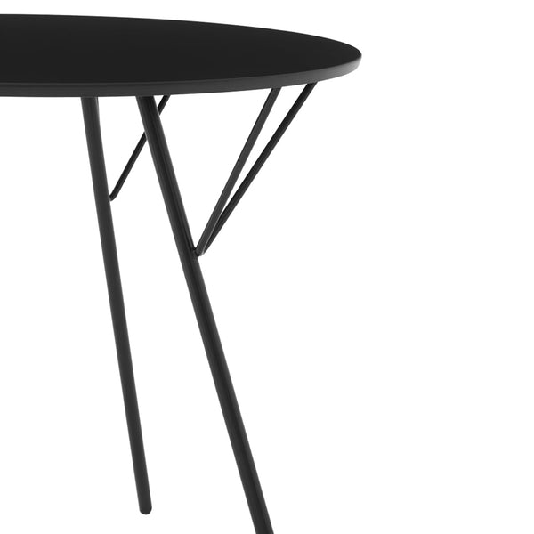 Round black table with minimalist design and sleek black metal legs, perfect for modern decor.