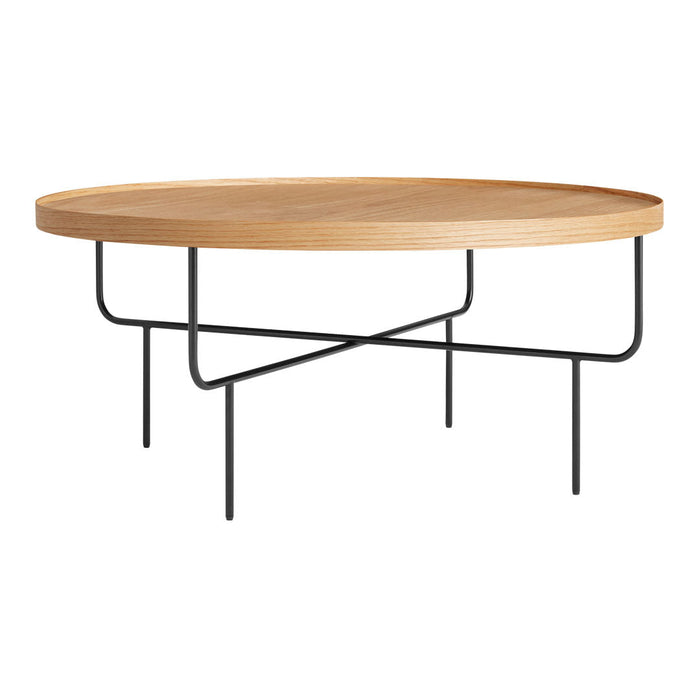 Round wooden coffee table with a natural oak finish and sleek black metal legs, showcasing a minimalist design.