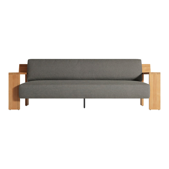 Gray upholstered sofa with light wood accents and minimalist design. Perfect for modern interiors.