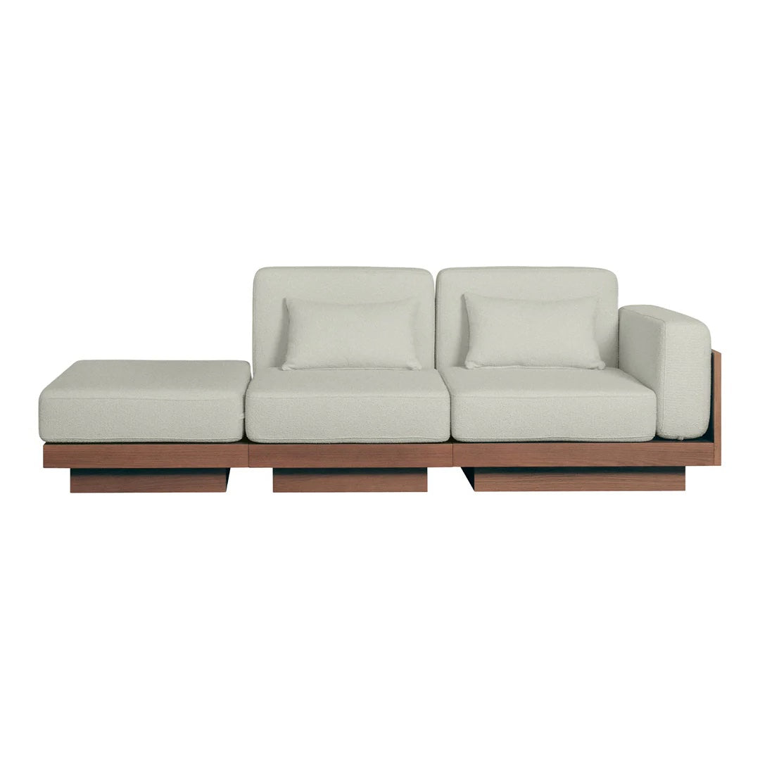 Light gray upholstery with clean lines and a minimalist design on a wooden frame. Modern and stylish sectional couch.