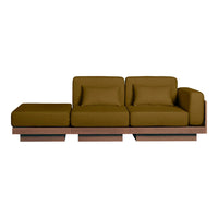 Olive green upholstered sofa with smooth cushions and minimalist wooden base. Perfect for modern living spaces.