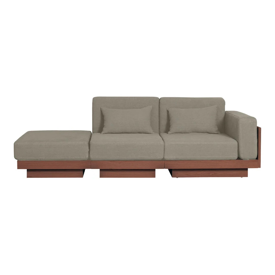 Modern sectional sofa in soft gray upholstery with a sleek wooden base, featuring minimalist design and clean lines.