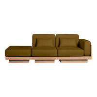 Olive green upholstered sofa with clean lines and minimalist wooden base, perfect for modern decor.