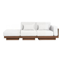 Modern sectional sofa featuring crisp white upholstery and a sleek brown base for a minimalist aesthetic.