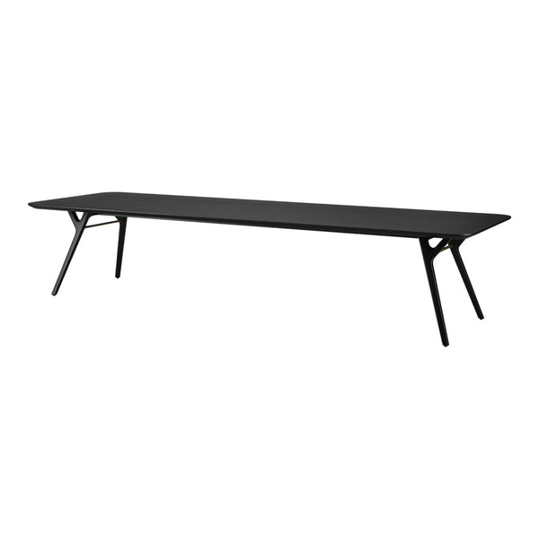 Sleek black coffee table with minimalistic design and sharp angles, perfect for modern decor.