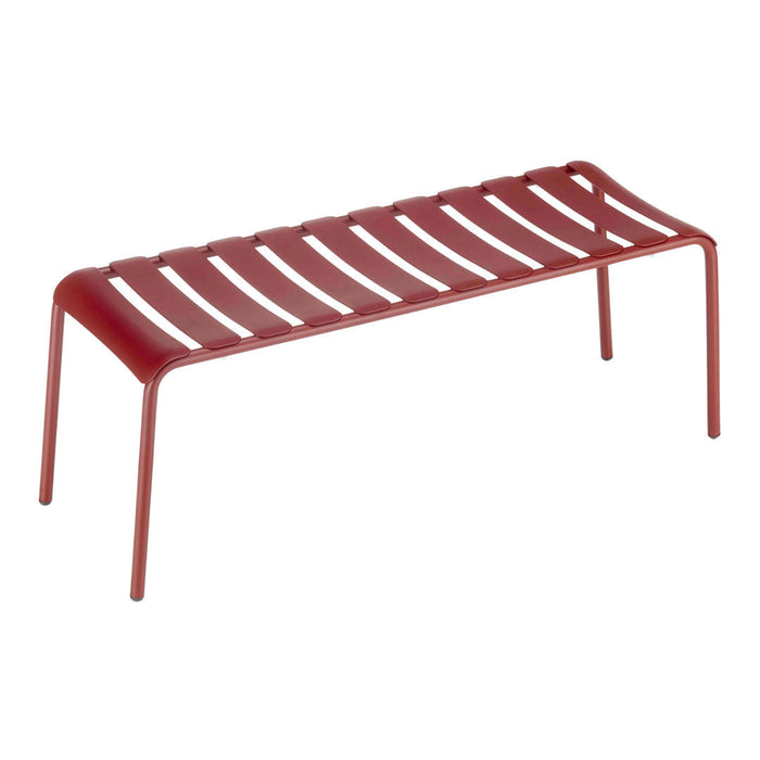 Red slatted metal bench with a vibrant finish and sleek, modern design. Perfect for stylish outdoor spaces.