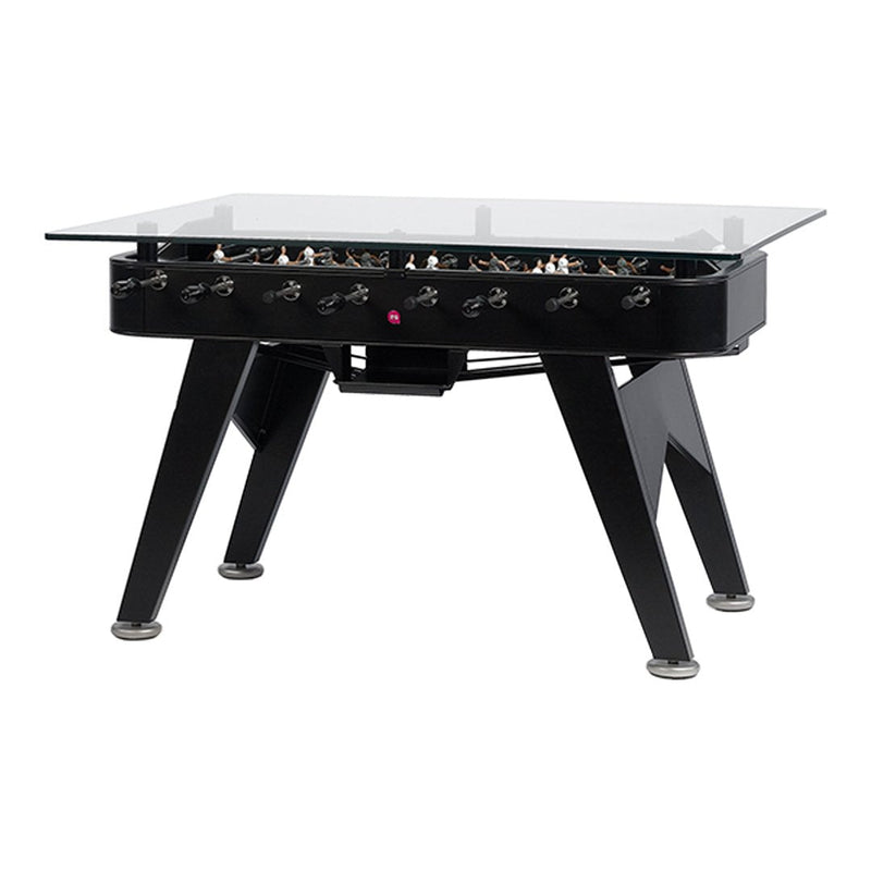 Black foosball table with a sleek glass top and modern design, featuring minimalist patterns and chrome accents.