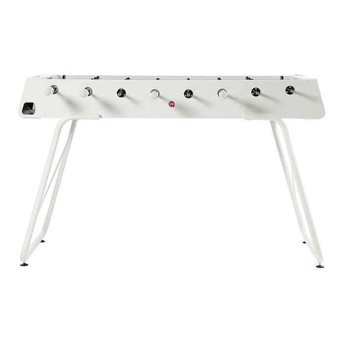White foosball table with sleek legs, featuring black and white detailing and colorful buttons. Ideal for modern decor.