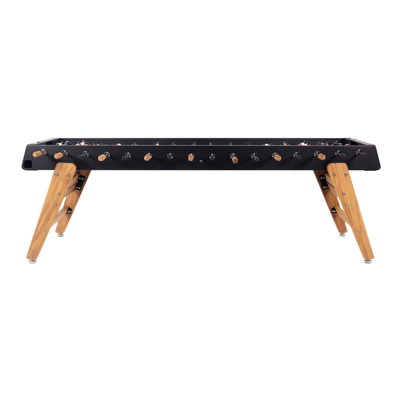 "Black tabletop with light wood legs, featuring metallic accents and a sleek, modern design."