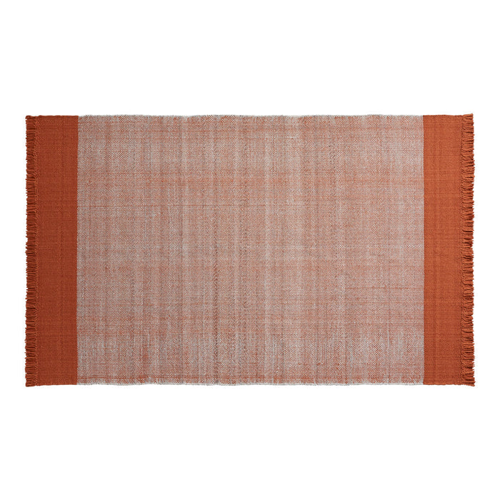 Rust-colored fringed rug with a textured, light orange background and solid dark orange borders.