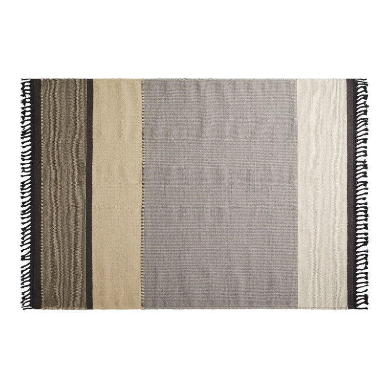 Multicolored striped rug featuring shades of beige, gray, and black with fringed edges. Ideal for modern decor.