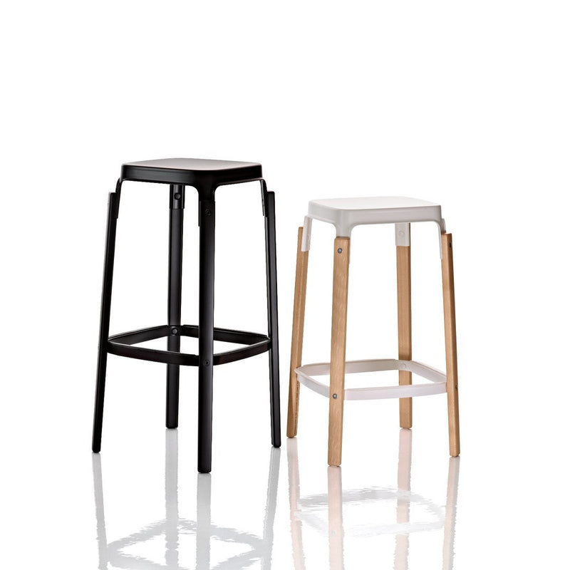 Set of two modern bar stools in black and white, featuring sleek designs with wood accents. Perfect for contemporary decor.
