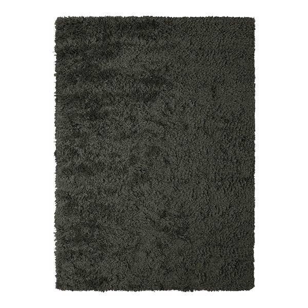 Soft dark gray shag rug with a plush texture, perfect for adding warmth and style to any space.