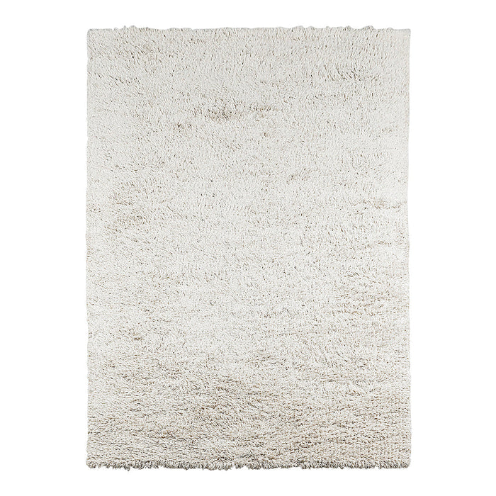 Soft, plush area rug in a cream hue with subtle texture, perfect for adding warmth to any space.