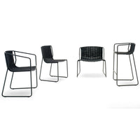 Set of four modern chairs featuring a sleek black metal frame and woven pattern seat in contrasting black tones.
