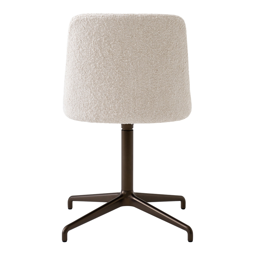 Cream textured fabric lampshade on a sleek brown metal base, perfect for modern decor.