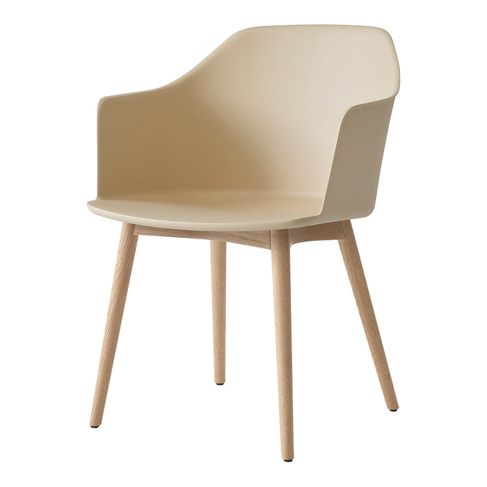 Beige modern chair with smooth surface and natural wood legs, featuring a minimalist design. Ideal for stylish interiors.