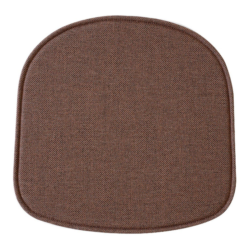 Brown textured square cushion mat with rounded edges, ideal for enhancing decor and comfort.