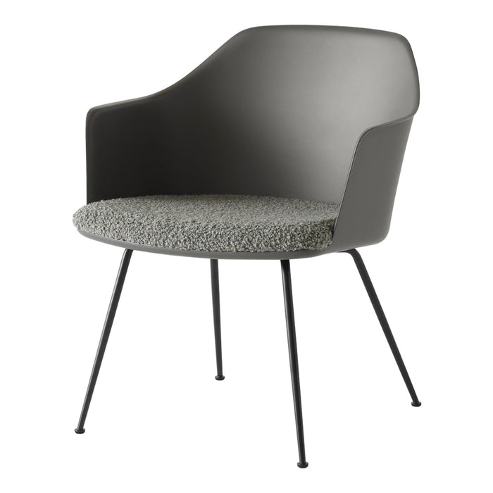 Gray armchair with a textured fabric seat and sleek black legs, featuring a modern design and minimalistic style.