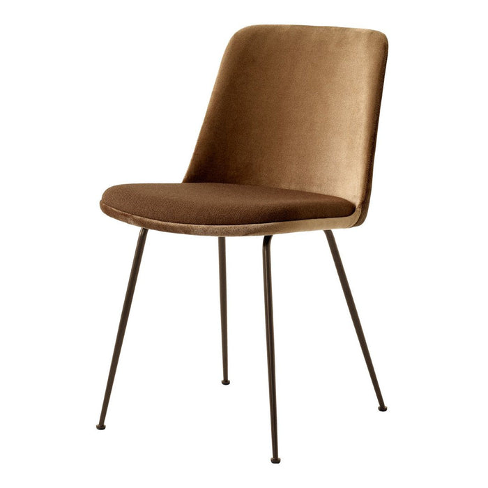 "Stylish brown velvet chair with sleek black metal legs, perfect for modern decor."