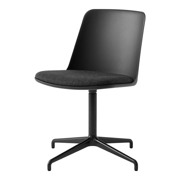 Black ergonomic chair with a smooth plastic back and textured dark gray fabric seat, featuring a sleek metal base.