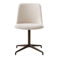 Cream-colored swivel chair with a textured, fluffy fabric and a sleek black metal base. Perfect for modern decor.