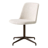 Cream textured chair with a plush finish and sleek brown metal base, perfect for modern interiors.