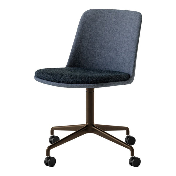 Dark denim blue upholstered chair with a smooth textured seat and a sleek brown metal base, modern design.