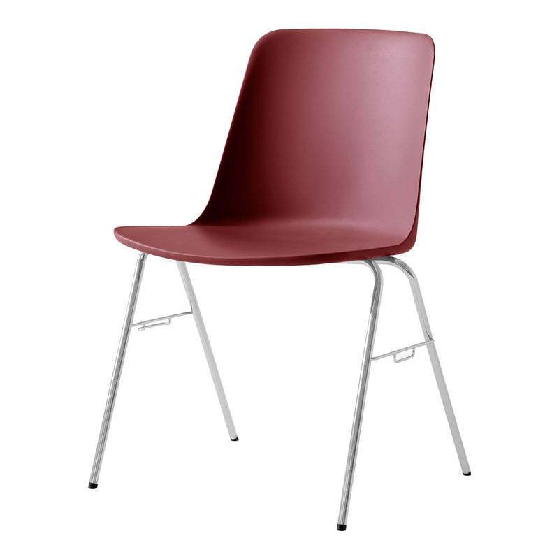 Minimalist burgundy chair with a smooth finish and sleek chrome legs, perfect for modern decor.