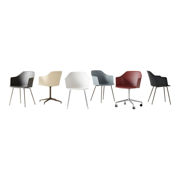 Assorted modern chairs in colors: black, white, cream, grey, and burgundy, featuring sleek, minimalist designs.