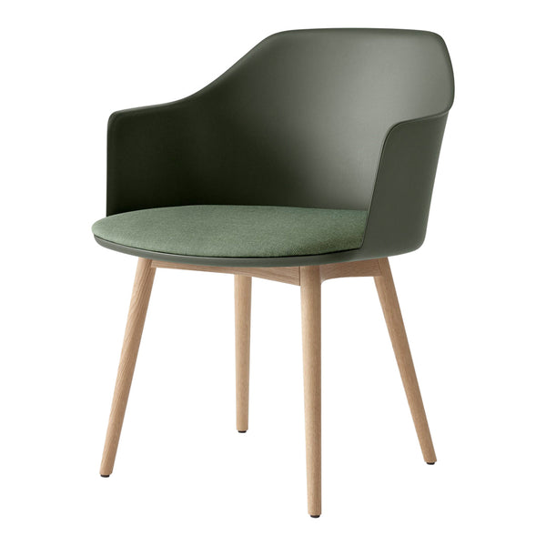 "Modern chair in deep green with a light green cushion and natural wooden legs."