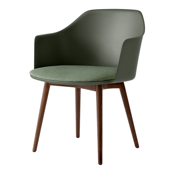 Stylish green chair with a smooth finish and contrasting wooden legs, perfect for modern decor.