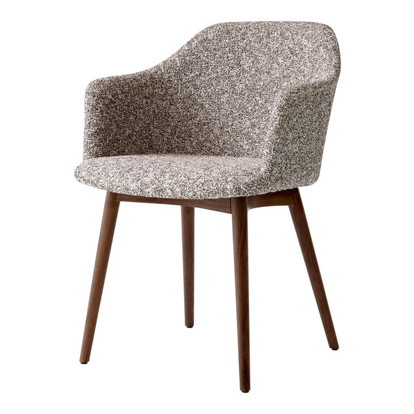 Textured gray and beige patterned upholstery on a modern armchair with wooden legs. Stylish and cozy design.