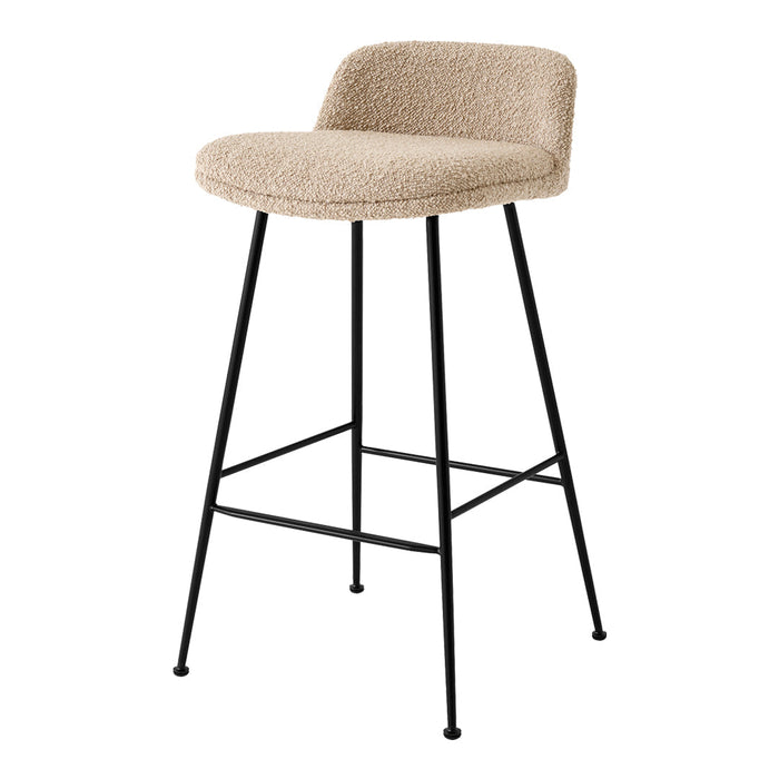 Beige upholstered bar stool with black metal legs, featuring a simple and modern design. Ideal for contemporary spaces.