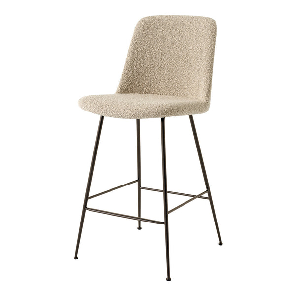 Beige textured fabric bar stool with sleek black metal legs. Modern design ideal for various decor styles.