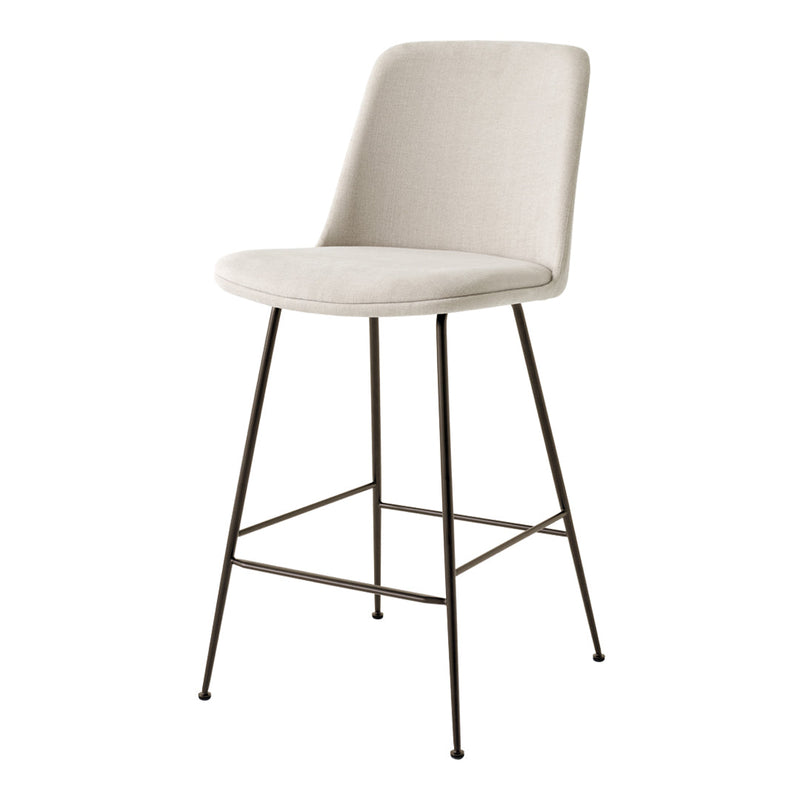 Beige upholstered bar stool with a smooth texture and black metal legs, perfect for modern decor.