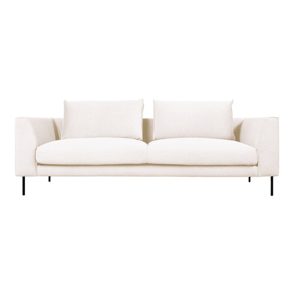 Elegant beige sofa with soft, textured upholstery and minimalist design, featuring clean lines and neutral colors.