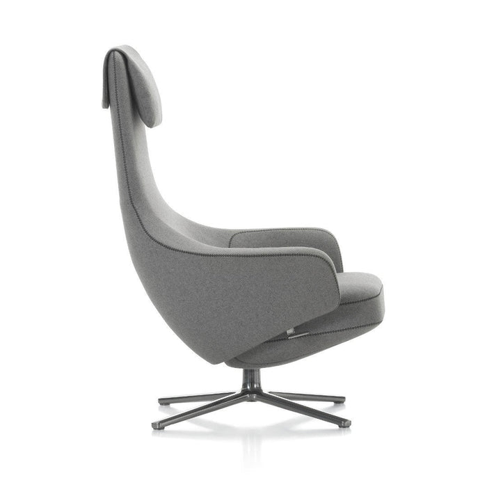 Stylish gray upholstered chair with a smooth finish and sleek metal base, featuring a modern and minimalist design.