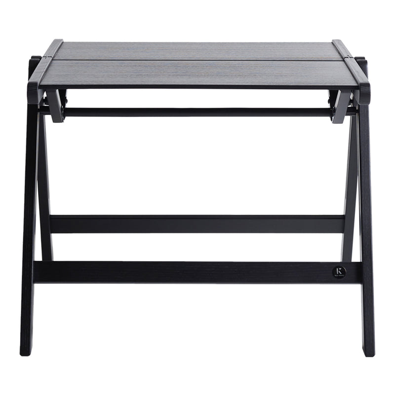 Black folding table with a slatted top design and sturdy metal frame. Minimalist style with a sleek finish.